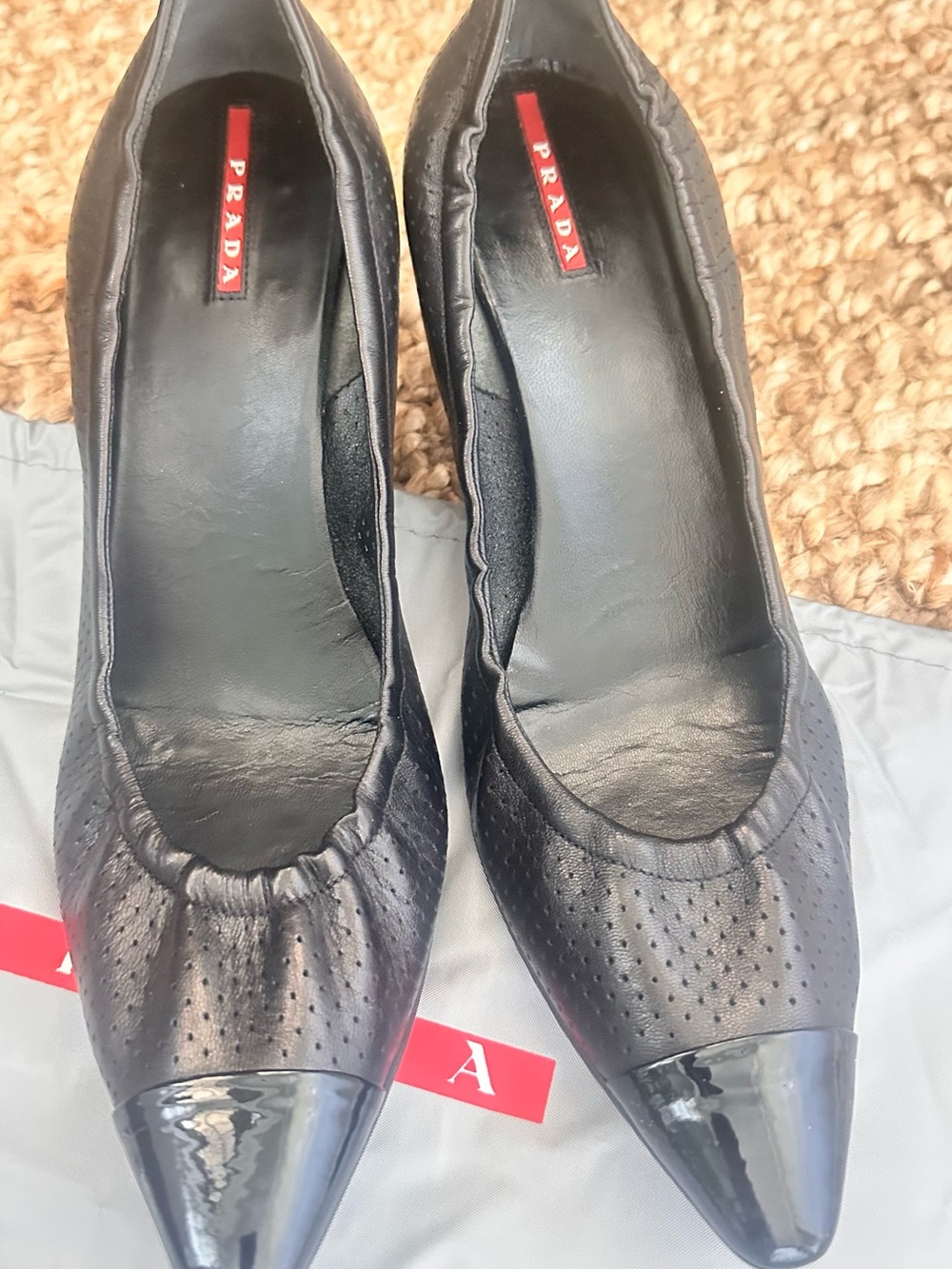 Prada Nappa Chic Hole Black Leather Patent Cap Toe Pumps EU 41 US 10.5 314422